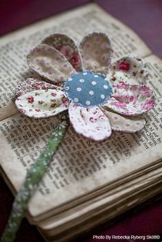 It's actually a bookmark ... but I love the way of making this flower, I can see this is a lot of uses, especially on a pillow, or with a wired stem in a cute country-style free-standing display