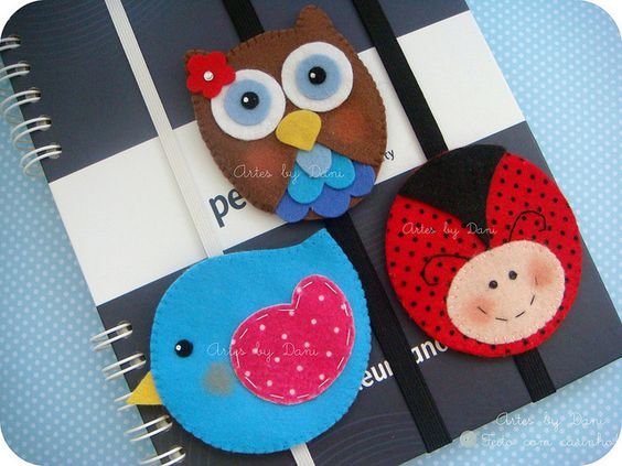 cute bookmarks, could use wooden images with felt on the back sandwiching the elastic glued between the wood and felt.: 