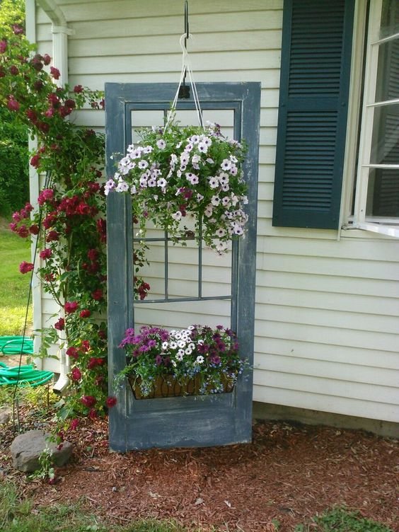 I love this garden door with the window box :): 