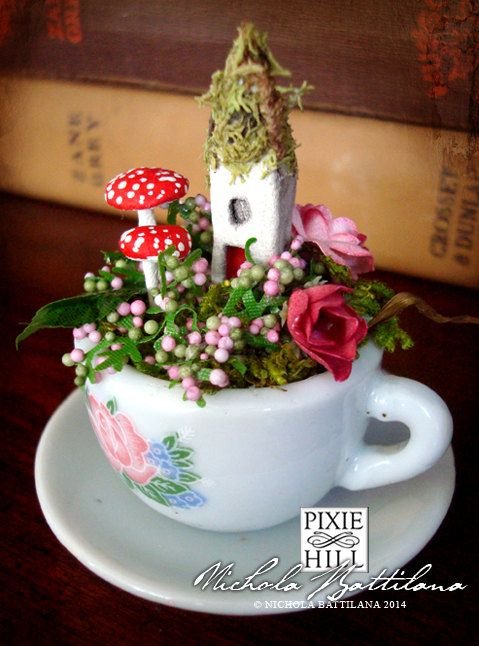 Fairy garden in a teacup... so cute!: