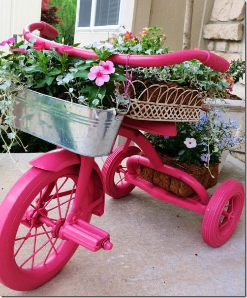 pink tricycle planter: 