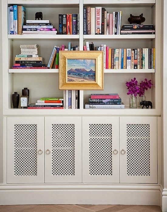 styled bookshelves with vented bottom cupboards for speakers, electronics, or radiators. Use thin layer of drywall on underside of shelf to keep the heat from radiating through the rest of the shelf: 