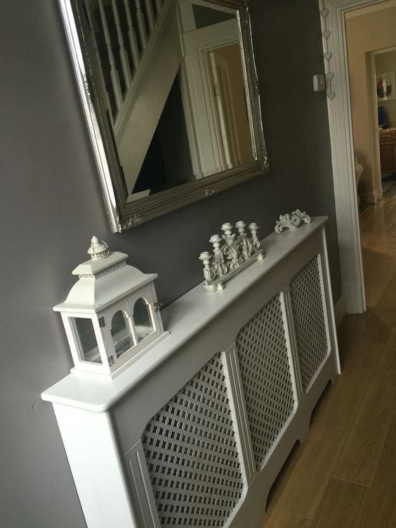 White radiator cover. Grey walls. Love the contrast and how bright grey walls make the white look: 