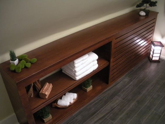 BUILD A CUSTOM BAMBOO RADIATOR COVERThis cover conceals a radiator and does double duty as storage.