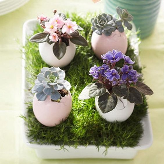 Fill eggs mini flowers and succulents for an adorable Easter centerpiece.  Pinned by Afloral.com from http://www.familyholiday.net/50-amazing-easter-centerpiece-decorative-ideas-for-any-taste