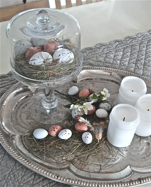 Nest of eggs on vintage silver tray