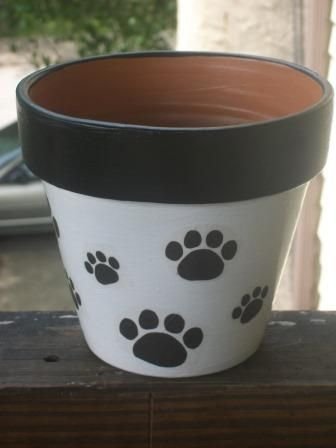 Paw Terra Cotta pot - base painted white, rim painted black, paws decoupaged onto base - - no link attached
