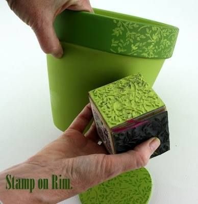Stamping the rim of a clay pot